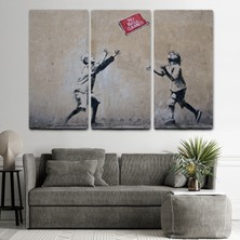 Dünyatablo Banksy Stencil'in Top Oyunları Yok Isimli Eseri Kanvas Tablo  ( Üç Parça   )