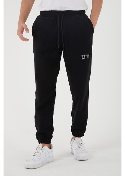 Erkek Regular Nakışlı Paça Lastikli Cepli Polar Eşofman Altı modelleri