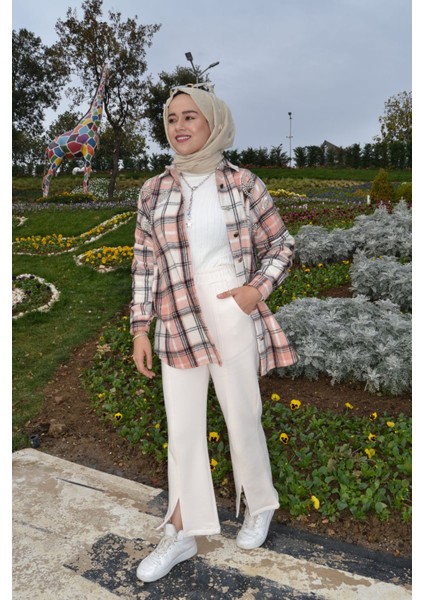 Krem Şardonlu Beli Lastikli Yırtmaç Detay Pantolon fiyatları