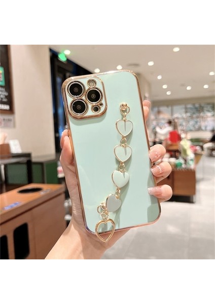 Apple iPhone 14 Pro Uyumlu Kılıf Kamera Korumalı Parlak Gold Kenar Kalpli Bileklik Toka Tutacak