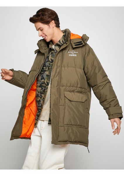 Kapşonlu Şişme Mont Anorak Cep Detaylı Fermuarlı Slogan Baskılı