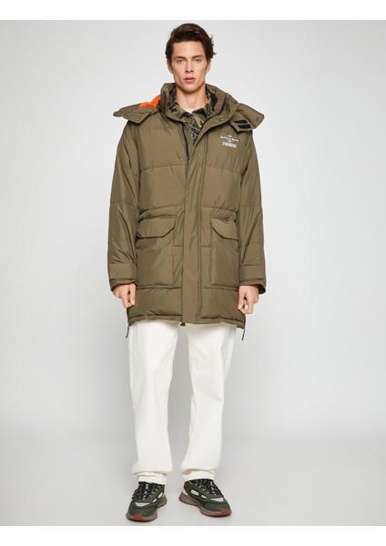 Kapşonlu Şişme Mont Anorak Cep Detaylı Fermuarlı Slogan Baskılı fiyatları