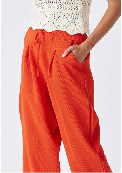 Beli Lastikli Fitilli Dokulu Turuncu Cepli Pileli Kadın Şalvar