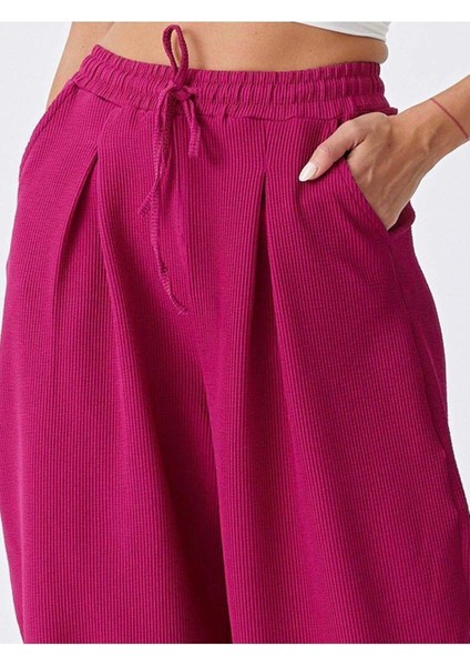 Beli Lastikli Fitilli Dokulu Turuncu Cepli Pileli Kadın Şalvar