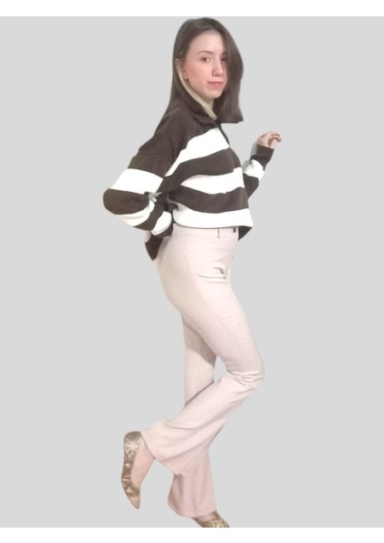 Ispanyol Paça Krem Renk Yırtmaç Detaylı Pantolon fiyatları