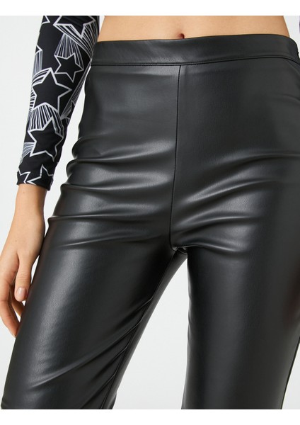 Deri Görünümlü Tayt Paçaları Yırtmaç Detaylı Nervürlü indirimleri
