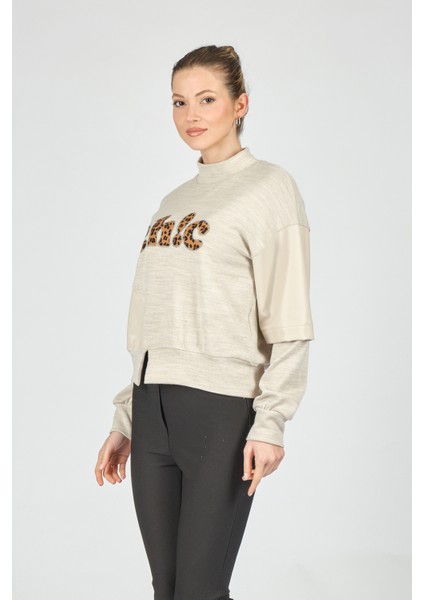 Minimalist Leopar Desenli Oversize Uzun Kol Crop Kadın Bluz fırsatları