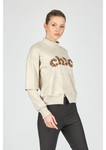 Minimalist Leopar Desenli Oversize Uzun Kol Crop Kadın Bluz indirimleri