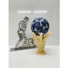 Karacan Hand Holding Globe