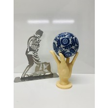 Karacan Hand Holding Globe