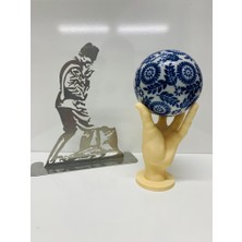 Karacan Hand Holding Globe