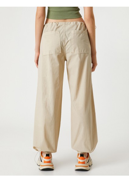 Paraşüt Pantolon Cep Detaylı Beli ve Paçası Lastikli fırsatları