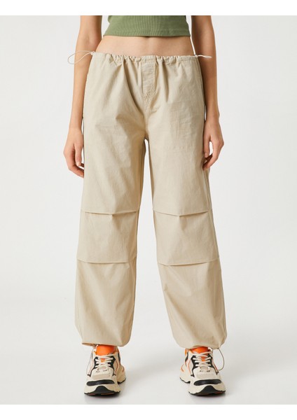 Paraşüt Pantolon Cep Detaylı Beli ve Paçası Lastikli modelleri