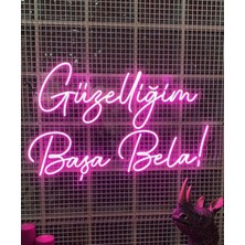 Dekoraven Güzelliğim Başa Bela Yazılı Neon LED Tabela Dekoratif Aydınlatma(50 x 32 Cm)