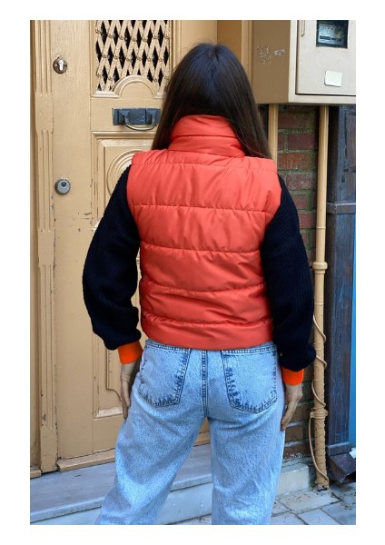 / Turuncu Mat Renk Iki Yan Cepli Dik Yaka Fermuarlı Şişme Yelek modelleri