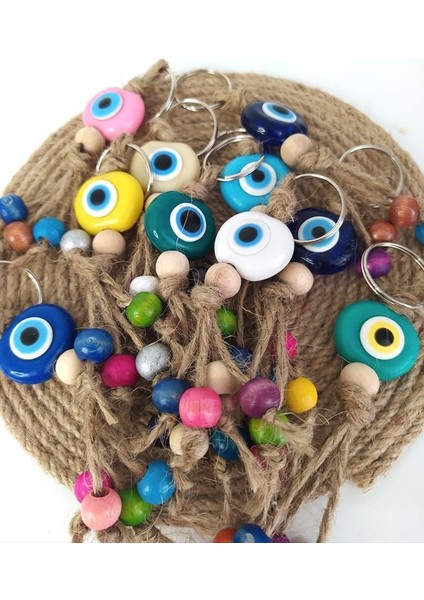 Nazar Boncuk Anahtarlık 20 Adet Karışık Renkli Kötü Göz Kovucu Nazar Hand Made Hasır Renkli Ahşap Boncuklu Nazarlı Anahtarlık modelleri