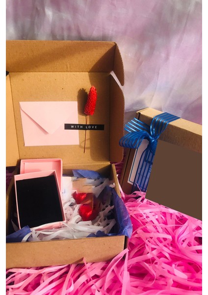 Kadın 925 Ayar Gümüş Sallantılı Baget Taşlı Küpe fiyatları