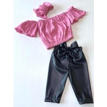 Özge Başaran Kız Çocuk, Likralı Deri Fiyonk Detaylı Pantolon, Pembe Straplez Crop Bluz ve Saç Bandı Takımı.