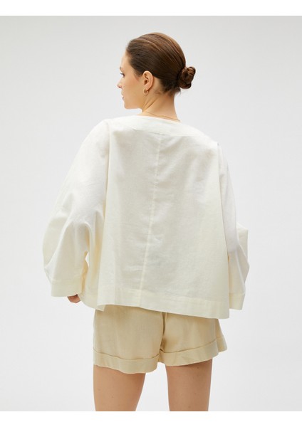 Oversize Bluz Keten Karışımlı V Yaka fırsatları
