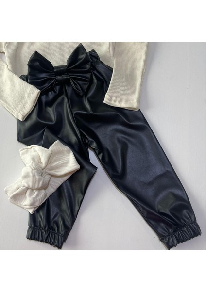 Kız Çocuk, Siyah Deri Fiyonk Detaylı Pantolon, Krem Omuzu Fırfırlı Badi ve Saç Bandı Takımı indirimleri