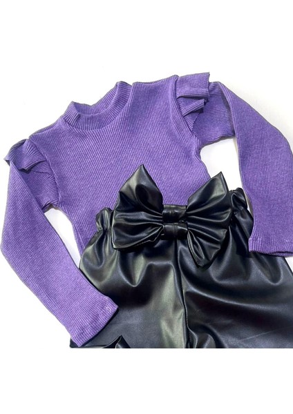 Kız Çocuk, Siyah Deri Fiyonk Detaylı Pantolon, Mor Omuzu Fırfırlı Badi ve Saç Bandı Takımı. fırsatları
