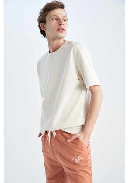 Boxy Fit Bisiklet Yaka Kısa Kollu Pamuklu Penye Tişört X3926AZ22AU fırsatları