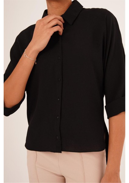23133339 Ön Kısa Arka Uzun Düğme Detaylı Kapri Kol Gömlek Siyah
