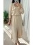 GOLD DÜĞME DETAYLI KUŞAKLI UZUN KREM ELBİSE 2