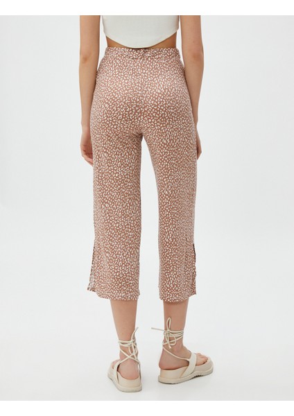 Bol Paça Pantolon Kapri Boy Yırtmaç Detaylı fırsatları