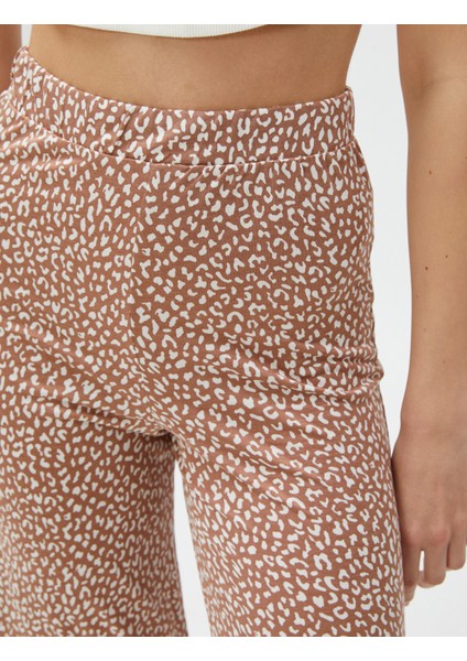 Bol Paça Pantolon Kapri Boy Yırtmaç Detaylı indirimleri