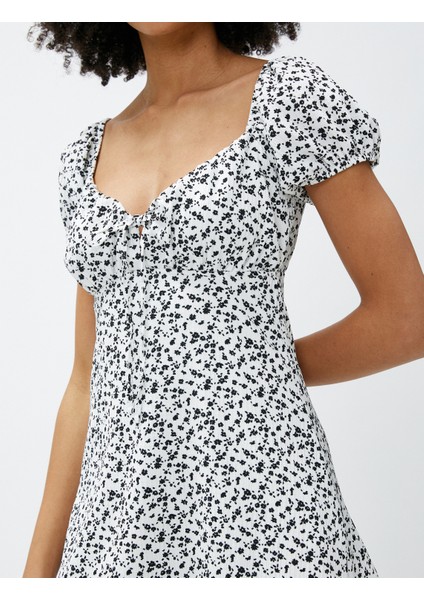 Mini Çiçekli Elbise Kalp Yaka Balon Kollu Bağlama Detaylı indirimleri