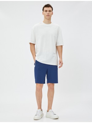 Koton Bermuda Şort Slogan Baskılı Beli Bağcıklı Fermuar Cepli Dar Kesim