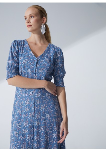 V Yaka Çiçek Desenli Mavi Diz Altı Kadın Elbise Gana1 modelleri