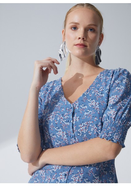 V Yaka Çiçek Desenli Mavi Diz Altı Kadın Elbise Gana1 indirimleri