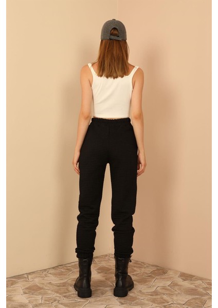 Kapitone Kumaş Bilek Boy Tam Kalıp Çıtçıt Detaylı Kadın Pantolon-Siyah modelleri