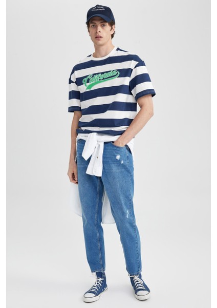 90's Slim Fit Dar Kalıp Yüksek Bel Dar Paça Yırtık Detaylı Jean Pantolon A3632AX23SM fırsatları