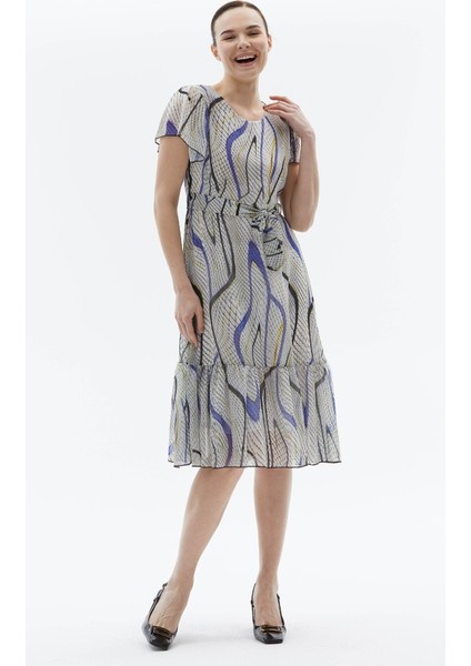 Kolu ve Etek Ucu Volanlı Piton Desen Elbise modelleri