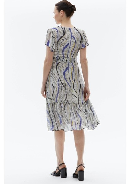 Kolu ve Etek Ucu Volanlı Piton Desen Elbise indirimleri