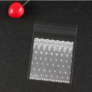 Ozan Tuhafiye Bantlı Şeffaf Desenli Poşet Opp 7x7 (+3) cm 95 Adet