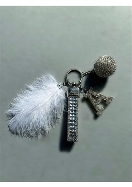 Gümüş Baget & Gümüş Disko Top & Gümüş Harf & Beyaz Tüy Anahtarlık