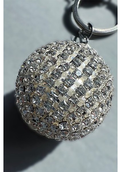 Gümüş Baget & Gümüş Disko Top & Gümüş Harf & Beyaz Tüy Anahtarlık fırsatları