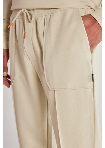 Unisex Bej Standart Fit Normal Kesim Cepli Pamuklu Esnek Eşofman Altı