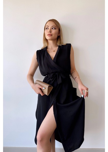 Kadın Siyah Kalın Askılı, Kruvaze Yaka, Düz Desen, Aerobin Yırtmaçlı, Kemerli Midi Elbise fiyatları