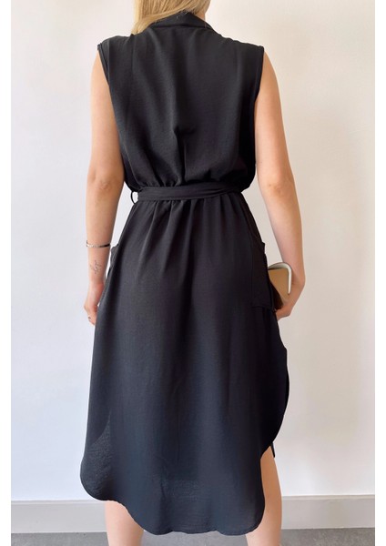 Kadın Siyah Kalın Askılı, Kruvaze Yaka, Düz Desen, Aerobin Yırtmaçlı, Kemerli Midi Elbise modelleri