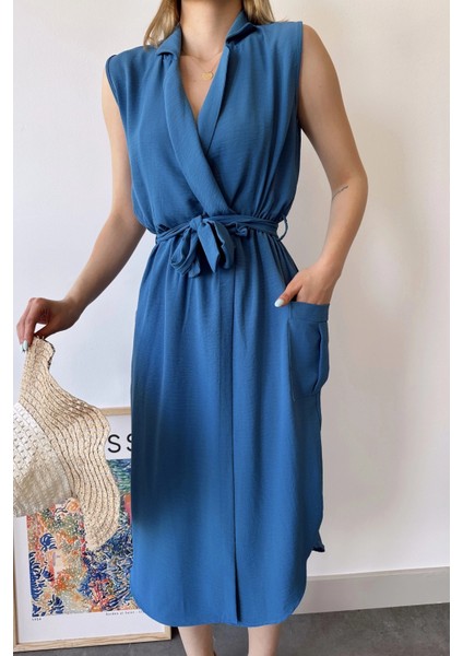 Kadın Indigo Kalın Askılı, Kruvaze Yaka, Düz Desen, Aerobin Yırtmaçlı, Kemerli Midi Elbise fiyatları