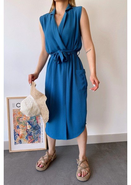 Kadın Indigo Kalın Askılı, Kruvaze Yaka, Düz Desen, Aerobin Yırtmaçlı, Kemerli Midi Elbise modelleri