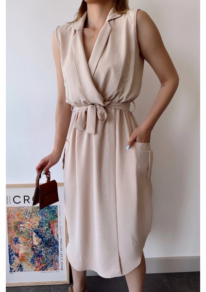 Kadın Bej Kalın Askılı, Kruvaze Yaka, Düz Desen, Aerobin Yırtmaçlı, Kemerli Midi Elbise indirimleri