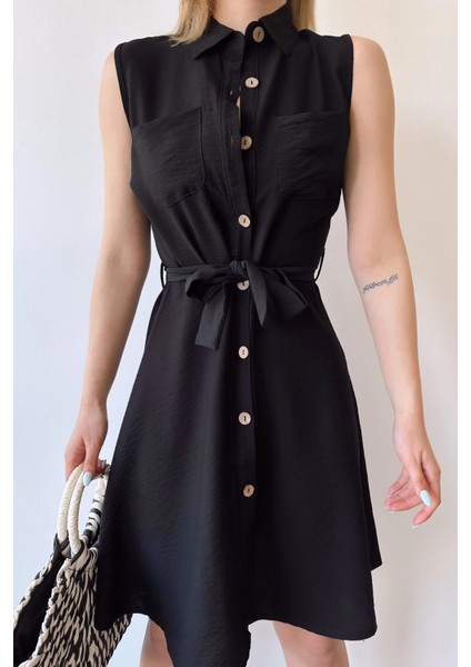 Kadın Siyah Kolsuz, Gömlek Yaka, Düz Desen, Çift Cep, A-Line Kesim, Aerobin, Kuşaklı Midi Elbise indirimleri