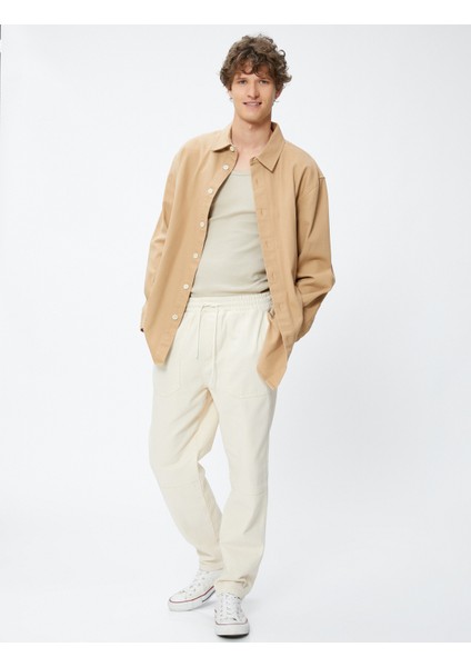 Beli Bağcıklı Pantolon Cep Detaylı Pamuklu fiyatları