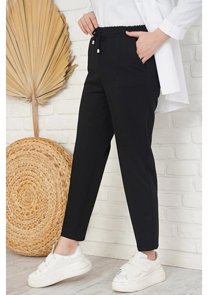 Kadın Havuç Kesim Bilek Boy Ip Detaylı Cepli Beli Lastikli Kumaş Pantolon